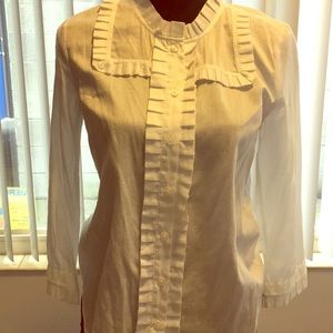 White cotton shirt with ruffle detail